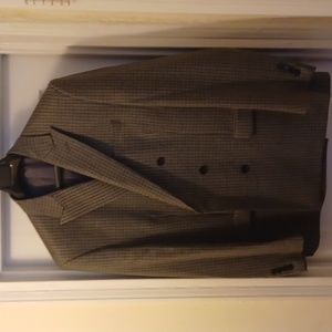 Double breasted sport coat. Multi colored houndstooth pattern, blue, green & gra